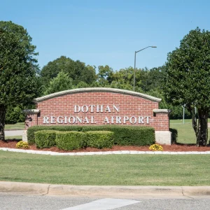 dothan regional airport signage with trees