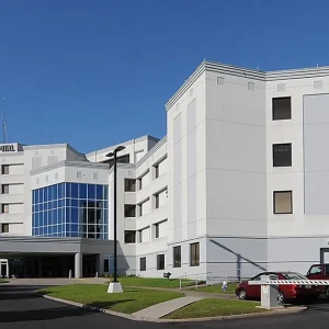 flowers hospital building with cars