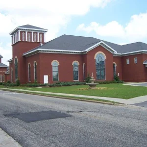 red building next to road